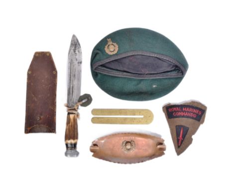 A collection of WWII Second World War British RM Royal Marines items comprising a beret, tunic shoulder patches,&nbsp;cigaret