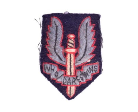 WWII Second World War - a believed original WW2 period SAS Special Air Service uniform cloth beret patch. Featuring the 'Who 