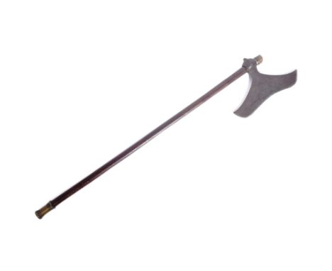 An early 20th Century Indian tribal Bulova / Bullova axe from Chota Nagpur. Double crescent shaped head mounted to the wooden