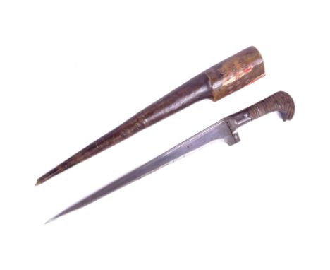 An Eastern Iran / Afghan Khyber knife / Choora knife. Ribbed wooden grip with a hooked pommel and a T-section blade housed in