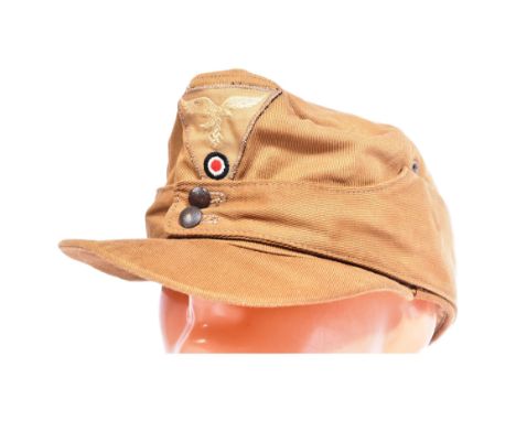 A WWII Second World War Third Reich Nazi German Luftwaffe Afrika Korps field cap. Tan / desert fabric with fold down back and