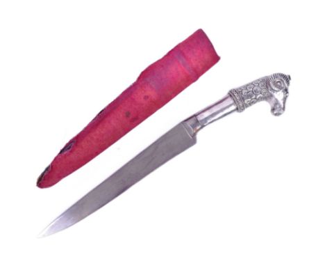 A 19th Century Indian Mughal Empire Khanjar dagger. Silvered hilt in the form of a rams head with a singled edges blade of wo