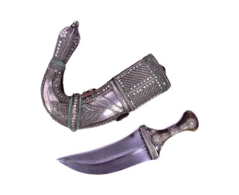 A 19th Century (Taiz) Jambiya / Khanjar dagger. Horn grip with applied white metal filigree style mounts. The blade with a pr