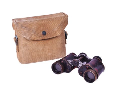 A pair of WWII Second World War British Kershaw made binoculars housed in 1941 dated (37 pattern) webbing pouch. The binocula