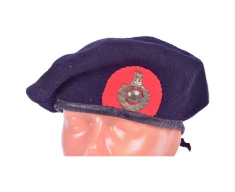 A WWII Second World War Royal Marines training beret. Red ' tomb stone ' patch with Royal Marines King Crown cap badge. Dated