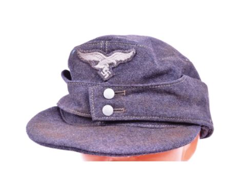 A WWII Second World War Third Reich Nazi German Luftwaffe Officers M43 ski cap. Field grey / blue wool with a front Luftwaffe