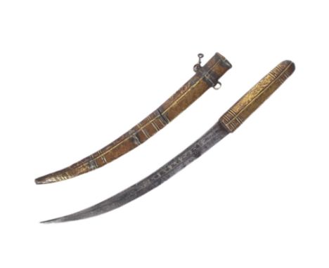 A North African Berber Shula knife / tribal dagger. The pressed metal hilt and scabbard with geometric patterns and a blade o