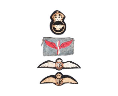 A collection of WWI First World War RFC Royal Flying Corps / RAF uniform cloth patches comprising x2 RFC wings, a 1918&nbsp;R
