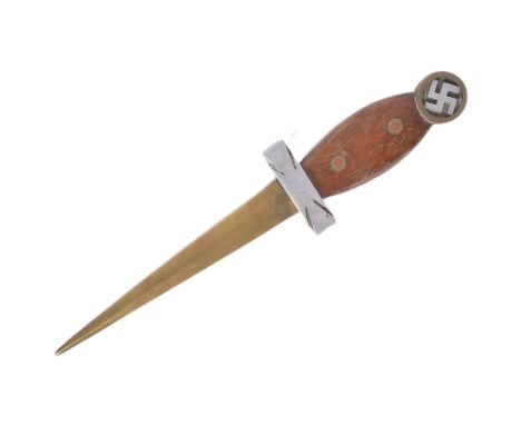 A WWII Second World War Third Reich Nazi German trench art style knife. The pommel with a brass cased Swastika, wooden grip a