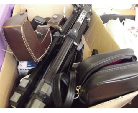 Vintage cameras and related equipment to include a tripod, Bell and Howell cine camera etc