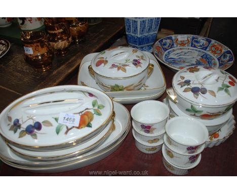 A quantity of Royal Worcester 'Evesham' including tureens, flan dishes, ramekin dishes, etc