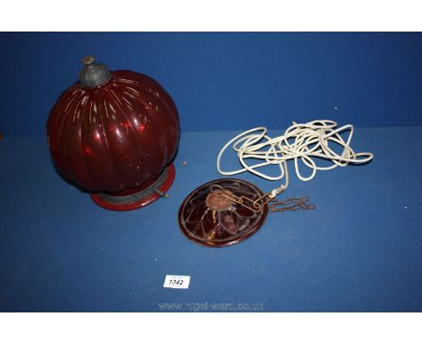 A red glass hanging lantern.