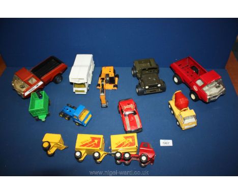 A small quantity of Tonka toys including two tipper trucks, Tonka digger, cement mixer, red car etc.