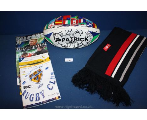A signed Patrick World Cup Rugby Ball with signatures including Tony Yapp and others, an England rugby scarf and four rugby p