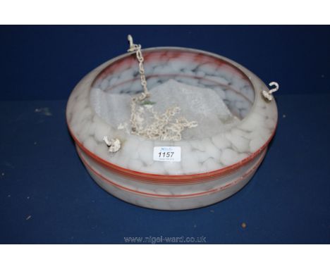 A mottled effect 1920's/1930's glass light shade.