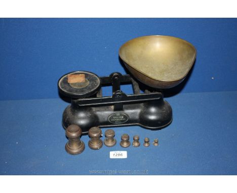 Set of brass Salters scales and weights.