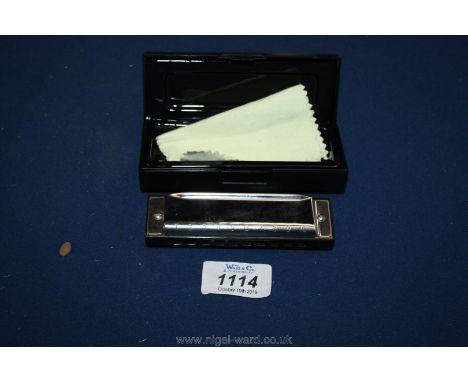 A cased Harmonica Ian 67294, model no. 228465, Milomex Limited.