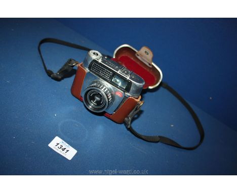 A Paxette Electramatic cased camera.