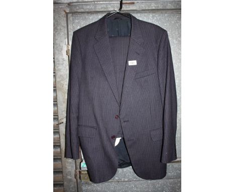 A Christian Dior gent's two piece Suit in multi coloured stripe, 42" chest, 32" waist, 29" leg.