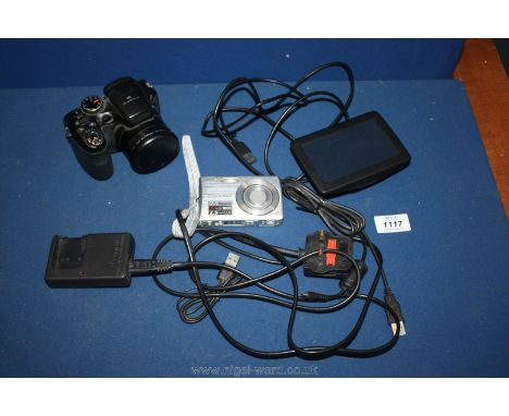 A Fujifilm finepix x5 14 megapixles Camera, Nikon coolpix S200 digital Camera with charger and a Tom-Tom satnav