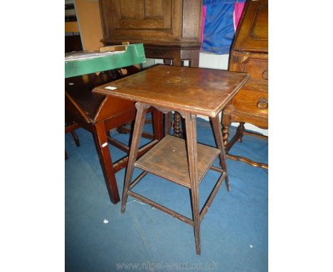 An inlaid mixed woods Edwardian occasional Table, the top with attractive mirrored pattern grain, light and darkwood stringin