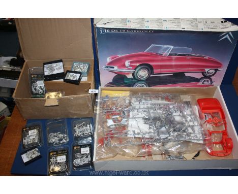 A 1.16 DS 19 Cabriolet kit car to make together with a box of wartime miniatures to make and paint.