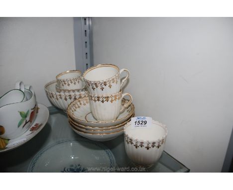 A late 18th c. fluted body, gilt decorated part Coffee set, possibly Worcester including four cups and saucers, large bowl an