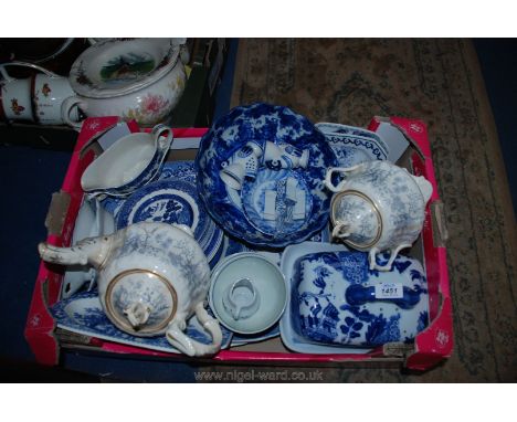 A quantity of blue and white china including meat plates, cheese dish, coffee cups and saucers, rice bowls etc.