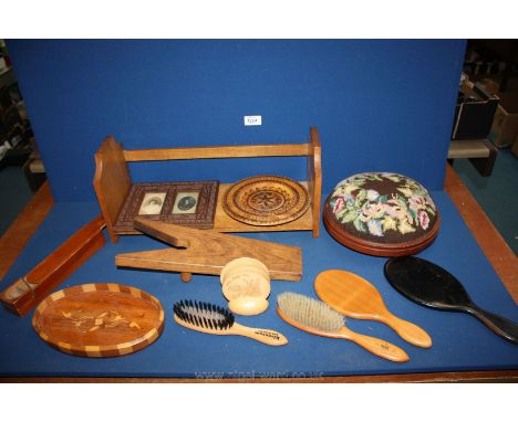 A quantity of Treen including tapestry topped footstool, brushes, frames, coasters, bookshelf etc