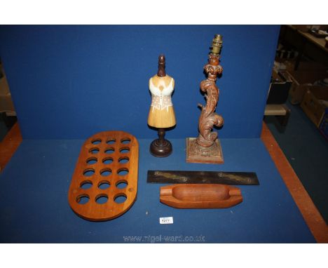A quantity of treen including carved lamp base, teak corn on the cob dish etc.