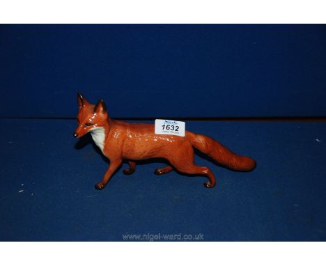 A large standing Beswick fox.