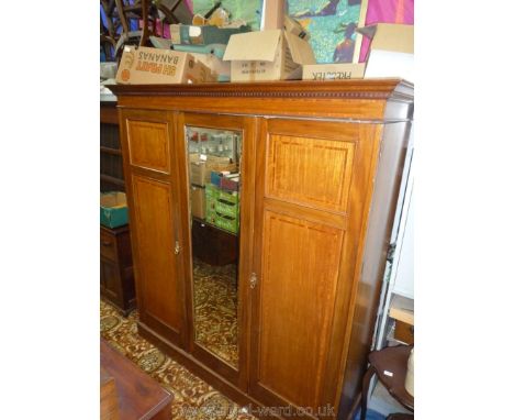 A good quality Edwardian crossbanded and light/dark wood strung Mahogany triple Wardrobe having to the left a flight of three