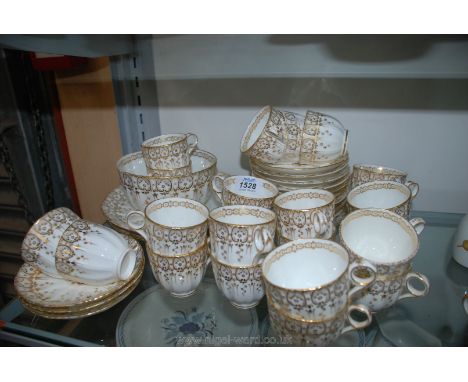 An early 19th c. semi-fluted body, white ground, gilt decorated part Tea/coffee set, no. 4/955 (unmarked, possibly Ridgeway) 