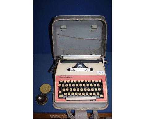 A cased Remington Typewriter.