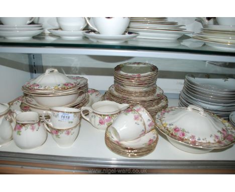 A Royal Doulton ''English Rose' Dinner/tea service including three meat platters, bread and butter plate, three lidded tureen