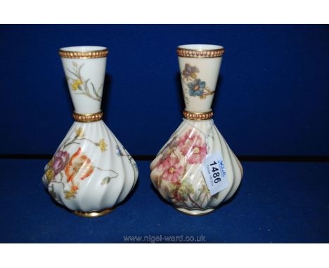 A rare pair of Royal Worcester blush Ivory bottle Vases with hand painted flowers and foliage highlighted in gilt with spiral