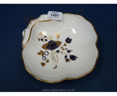 A Royal Worcester shell shape Dish with hand-painted blue flowers and gilt foliage standing on three shell shape gilt feet, p