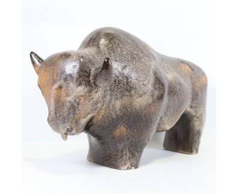 KURT TSCHORNER for Ruscha, a 1970s' ceramic bison figure, length 45cm Good condition, small chip to front foot