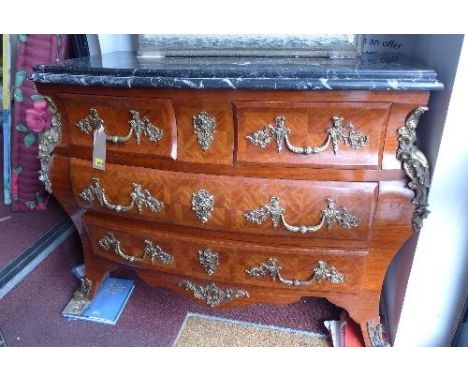 A French Louis XV style kingwood commode, the  marble top over two short and two long drawers with ormulu mounts raised on sp
