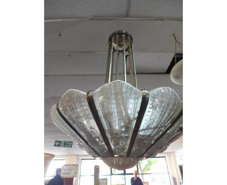 A large and impressive Art Deco style 12 light chandelier, with floral frosted glass slide in shades, H.110cm, reportedly fro