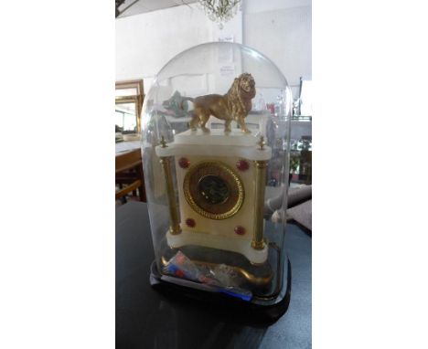 A 19th century French alabaster and gilt metal mantel clock, Arabic chapter ring and visible Brocot escapement, gilt metal li