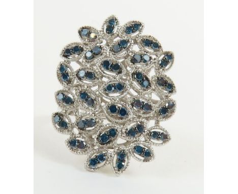 A silver and treated blue diamond dress ring, finger size R, marked '925', 7.1g gross