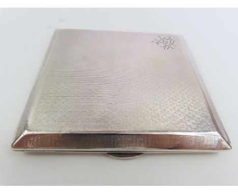 A silver cigarette case, engine turned decoration, 105 g gross 