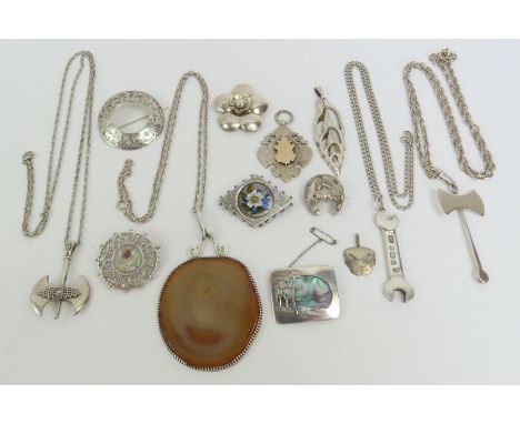 A Victorian brooch, the central panel with enamelled flowers; a silver pendant in the form of a spanner; together with variou