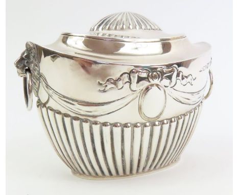 A late Victorian silver tea caddy, by Joseph Round, Sheffield 1898, of oval outline, gadrooned with drape garland and bows ab