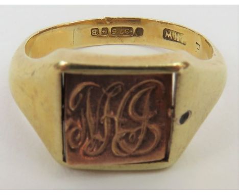 A 9ct gold Masonic swivelling head signet ring, the square head with typical blue enamel and decoration to one side and monog