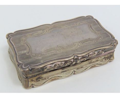 A Victorian silver snuff box, by Edward Smith, Birmingham 1858, engine turned with a vacant cartouche, approximately 6 cm lon