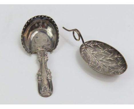 A Georgian silver caddy spoon, by John Bettridge, Birmingham 1817, the horseshoe shaped bowl to a hollow handle, monogrammed,