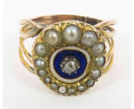 A 19th century ring, the old cut diamond set in silver to a royal blue enamel circle, surrounded by a row of seed pearls, fin