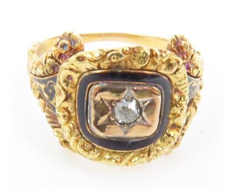 An early Victorian mourning ring, the single old cut diamond star set, surrounded by black enamel, the mount and faux split s